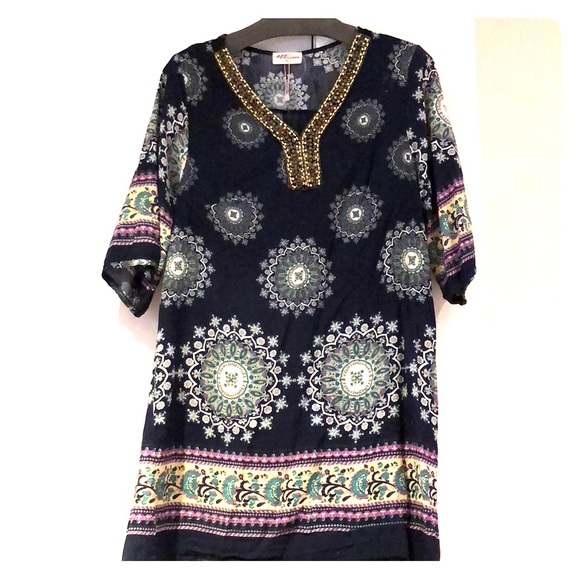 Dresses & Skirts - Dress with beaded collar.